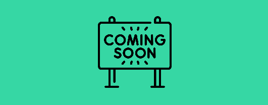 Sign on green background that says coming soon